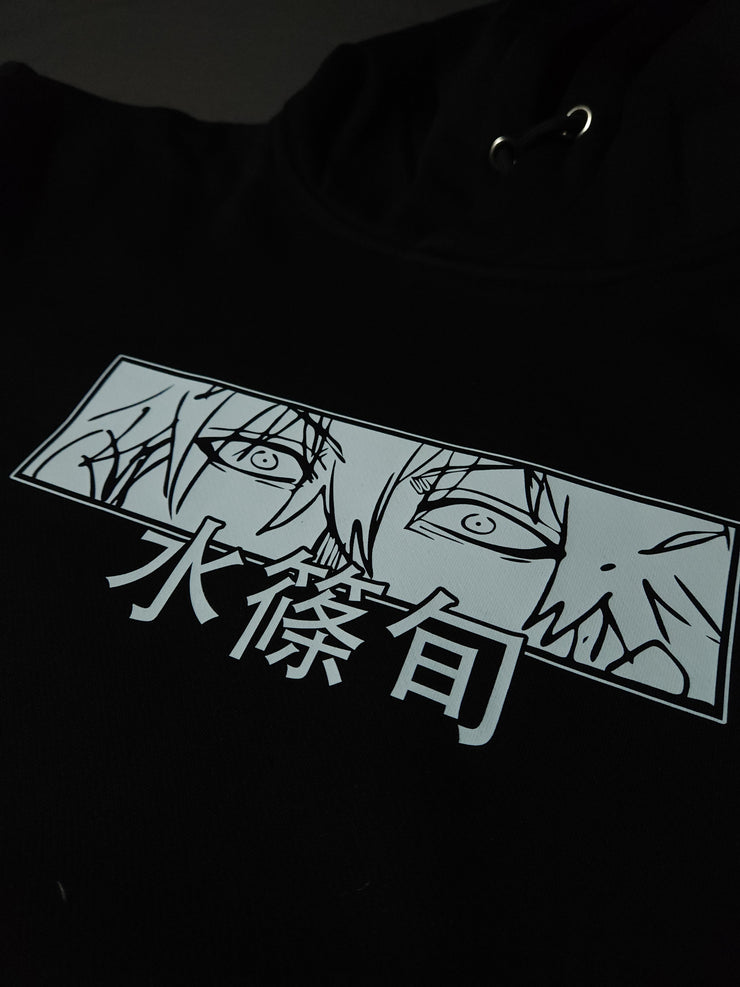 Anime-inspired apparel featuring bold back artwork, worn by a model in a dark studio setting – from a South African anime clothing brand.