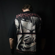 Anime-inspired apparel featuring bold back artwork, worn by a model in a dark studio setting – from a South African anime clothing brand.