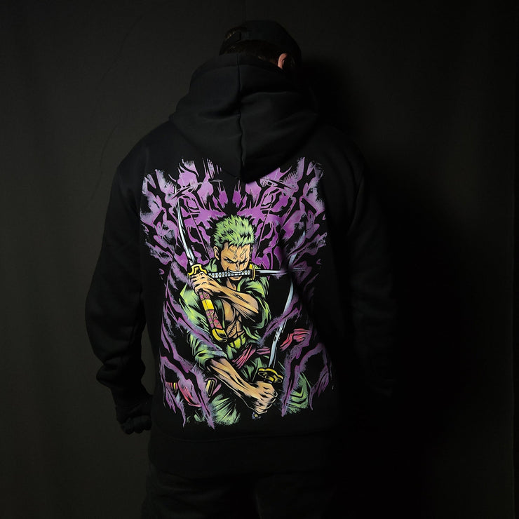 Anime-inspired apparel featuring bold back artwork, worn by a model in a dark studio setting – from a South African anime clothing brand.