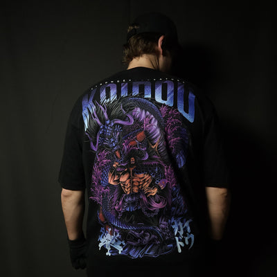 Anime-inspired apparel featuring bold back artwork, worn by a model in a dark studio setting – from a South African anime clothing brand.