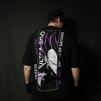 Anime-inspired apparel featuring bold back artwork, worn by a model in a dark studio setting – from a South African anime clothing brand.