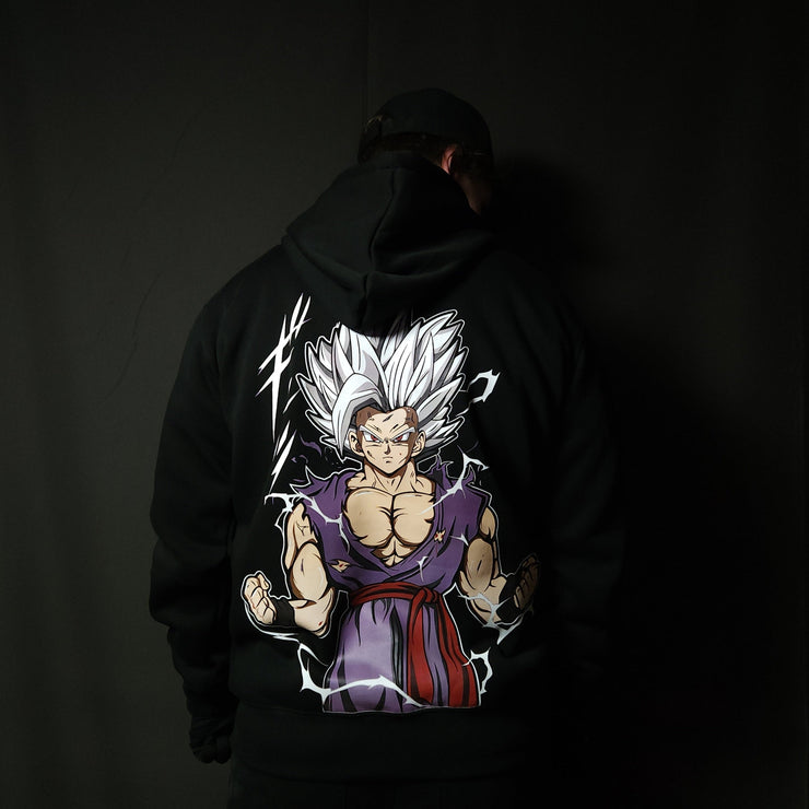 Anime-inspired apparel featuring bold back artwork, worn by a model in a dark studio setting – from a South African anime clothing brand.