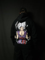 Anime-inspired apparel featuring bold back artwork, worn by a model in a dark studio setting – from a South African anime clothing brand.