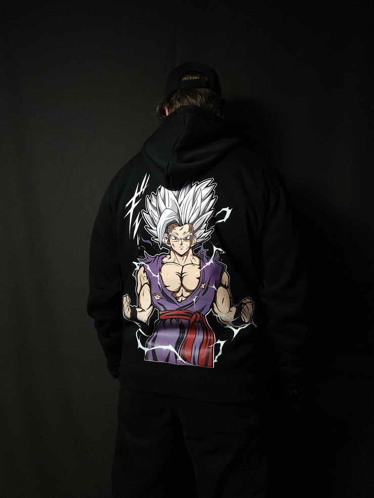 Anime-inspired apparel featuring bold back artwork, worn by a model in a dark studio setting – from a South African anime clothing brand.