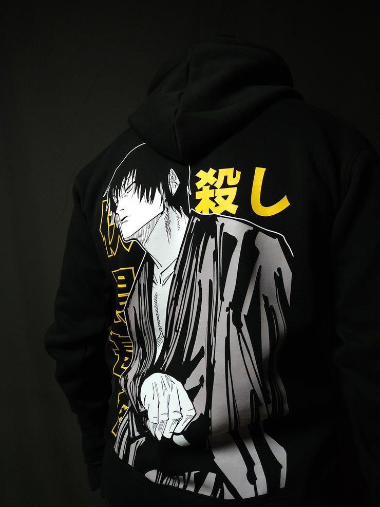 Anime-inspired apparel featuring bold back artwork, worn by a model in a dark studio setting – from a South African anime clothing brand.