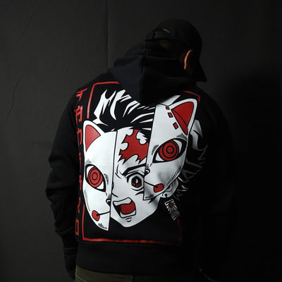 Anime-inspired apparel featuring bold back artwork, worn by a model in a dark studio setting – from a South African anime clothing brand.