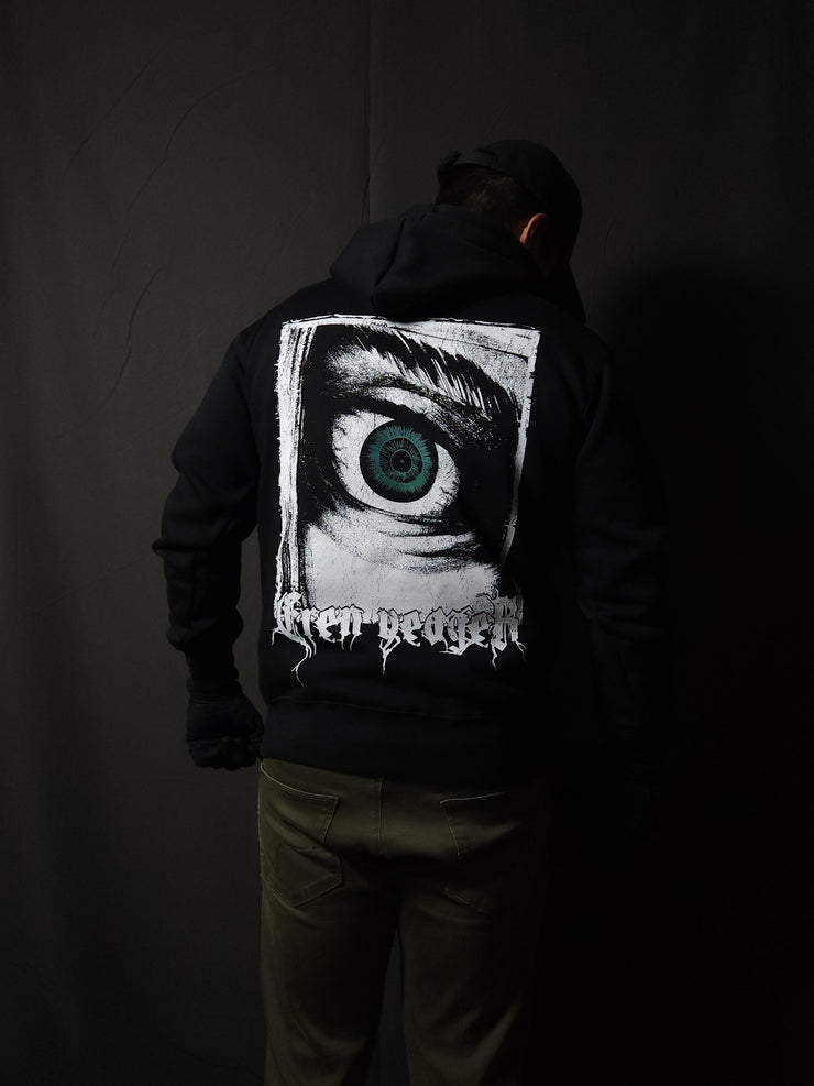 Anime-inspired apparel featuring bold back artwork, worn by a model in a dark studio setting – from a South African anime clothing brand.