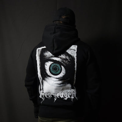 Anime-inspired apparel featuring bold back artwork, worn by a model in a dark studio setting – from a South African anime clothing brand.