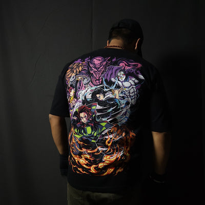Anime-inspired apparel featuring bold back artwork, worn by a model in a dark studio setting – from a South African anime clothing brand.
