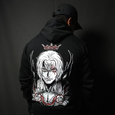 Anime-inspired apparel featuring bold back artwork, worn by a model in a dark studio setting – from a South African anime clothing brand.