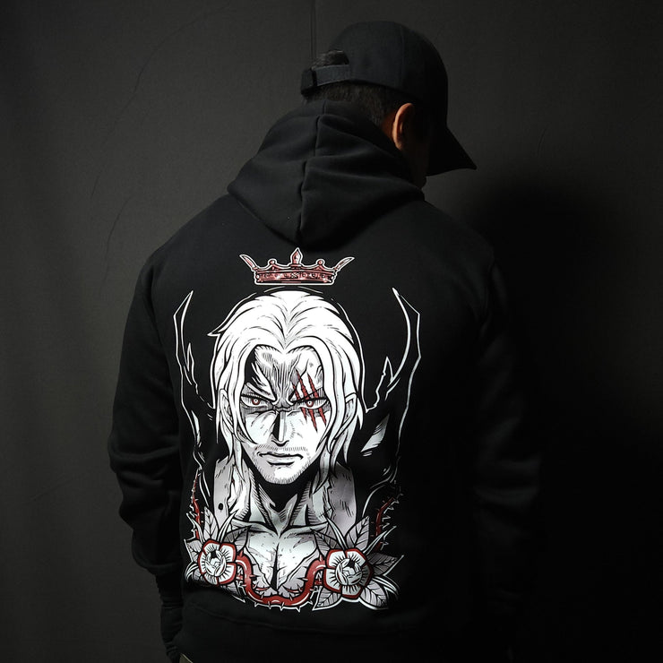 Anime-inspired apparel featuring bold back artwork, worn by a model in a dark studio setting – from a South African anime clothing brand.