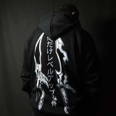 Anime-inspired apparel featuring bold back artwork, worn by a model in a dark studio setting – from a South African anime clothing brand.